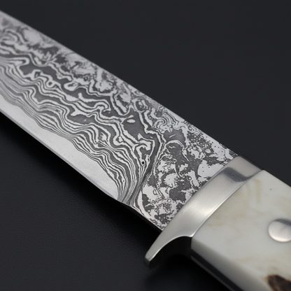 Extreme close-up of Damascus steel blade flowing layered pattern on black charcoal background side lit
