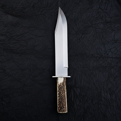 D2 steel classic Bowie knife stag antler handle steel crossguard studio shot deep black charcoal background