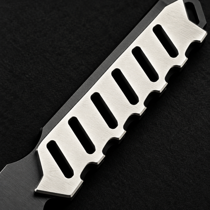 Extreme close-up of skeletonized stainless steel handle with rectangular cutouts on deep black charcoal background