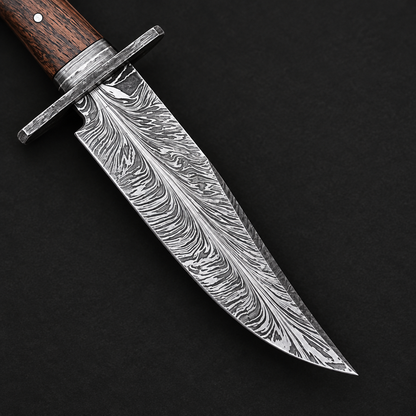 Close view of flowing Damascus blade pattern on hunting knife