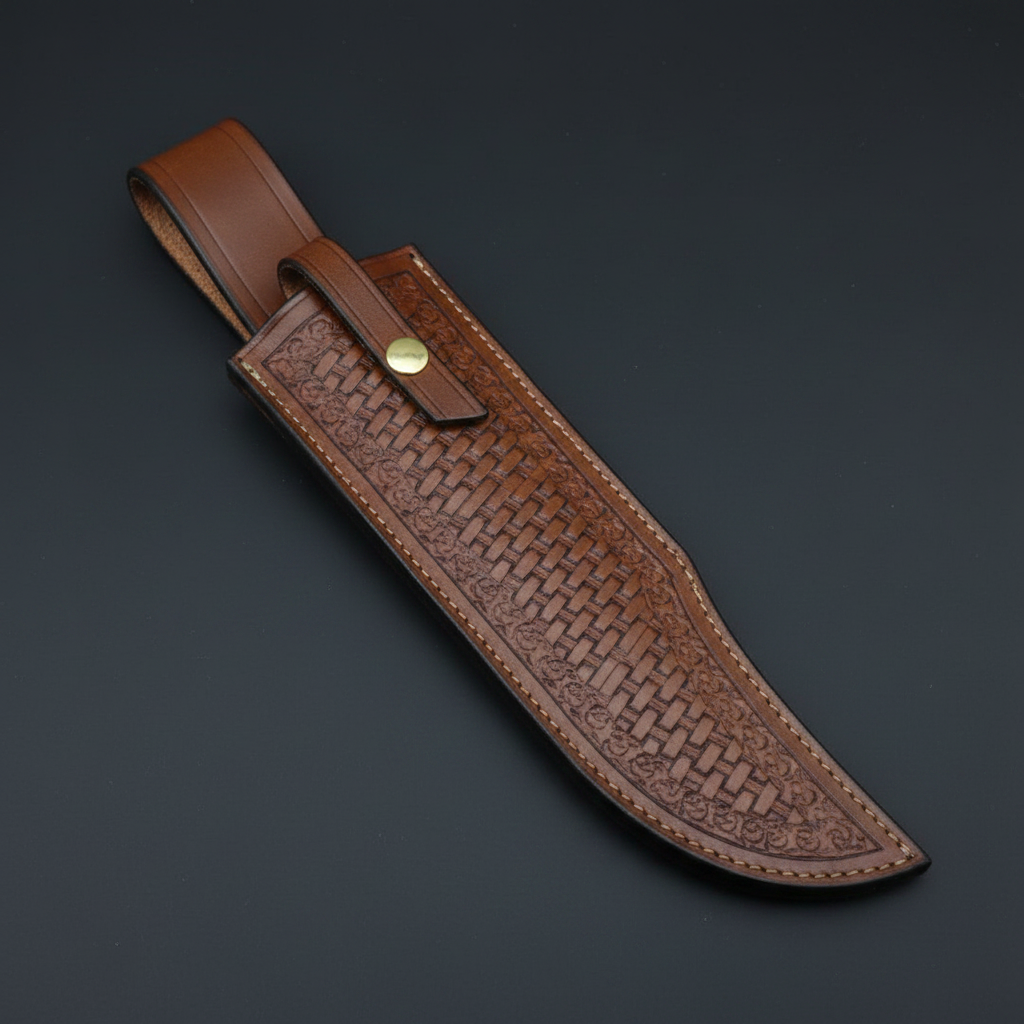 Close view of the genuine brown basketweave stamped Bowie leather sheath with belt loop and retaining strap