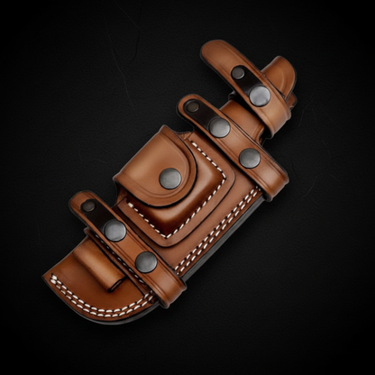 Premium leather horizontal scout carry knife sheath centered on deep black charcoal background studio shot
