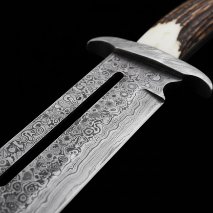 Close up macro shot of hand forged Damascus steel Bowie blade showing intricate layered swirling steel pattern