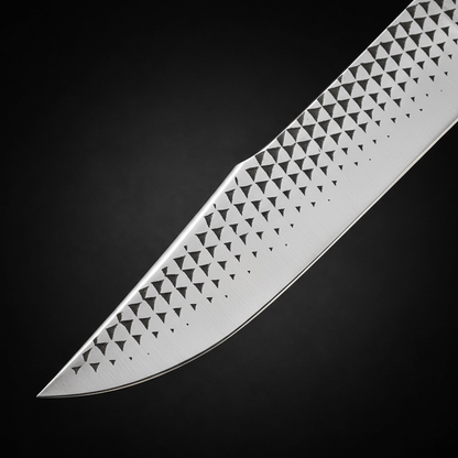 Extreme close-up macro of hand forged farrier rasp blade triangle pattern texture clip point on black charcoal background